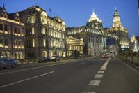 the city has two big building on one side and some buildings on the other side