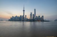 Shanghai Dawn: Cityscape Overlooking the Ocean