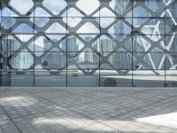 an image of a large building inside a glass structure of glass and a couple of people standing with luggage