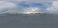 a sky view shows a view from the bottom of a ramp on a cloudy day