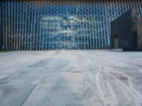 a large structure is shown through the glass windows of it's outside view area