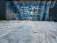 a large structure is shown through the glass windows of it's outside view area