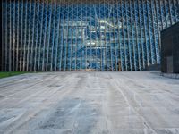 a large structure is shown through the glass windows of it's outside view area