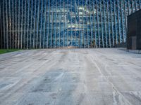 a large structure is shown through the glass windows of it's outside view area