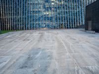 a large structure is shown through the glass windows of it's outside view area