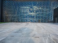 a large structure is shown through the glass windows of it's outside view area