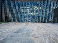 a large structure is shown through the glass windows of it's outside view area