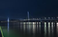 Shenzhen Night Skyline: Illuminated Bridges Over Calm Waters