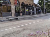 a man on a skateboard in front of a building that has been constructed into a store