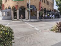 a man on a skateboard in front of a building that has been constructed into a store