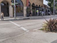a man on a skateboard in front of a building that has been constructed into a store