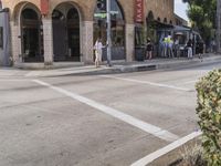 a man on a skateboard in front of a building that has been constructed into a store