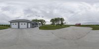 two fisheyes are shown of a skate park in a small town with a road and some trees