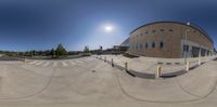 a very pretty skate park with some big ramps for riding it and a nice bright sun