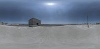 a 360 - degree photograph of a skateboarder at the skate park near the parking lots