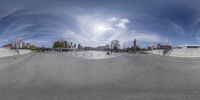 the 360 - view lens photo of a skateboard park and skating course is shown