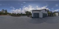 this is a shot of a small skateboard park with a garage that has been set up with a camera