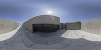 a skateboarder is seen doing tricks in this fisheye shot, as the sun shines in the background