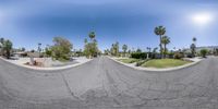 a skateboarder is making a trick in a half - pipe near a house