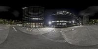 an image of a skateboarder performing a trick at night in a skate park