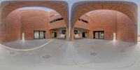 two different angles of a skate boarder on a ramp, with the view of an indoor area and two sets of double glass walls in front of doors