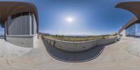 two fish eye panoramas of the skateboarder who is doing tricks on a ramp