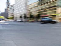 a person on a skateboard in the street with a blurry image behind them