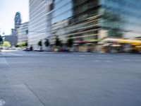 a person on a skateboard in the street with a blurry image behind them