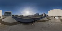 a skateboarder is riding down the ramp on his board and has the camera in the air