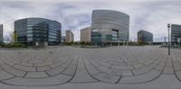 a man is in the middle of a sphere on a skateboard while a city looks on