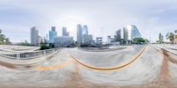 this skateboarder is skating on a curved ramp in the city of los angeles