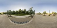 a 360 - camera photo of a skateboarding ramp and the name war vehicles in the park