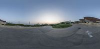 the view is taken through the fish eye lens of a skateboarder doing tricks