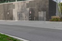 a person on a skateboard in front of a large building with a lot of windows