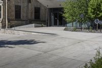 a guy skateboarding up a flight of stairs with a skateboard in front of it