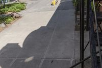 a person riding down the stairs of an old building on a skateboard board ride