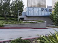 a person on a skateboard is doing a trick in front of the center of a building