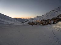 the ski slopes are in a row and there is no snow on the ground at sunset