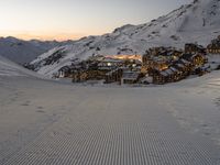 the ski slopes are in a row and there is no snow on the ground at sunset