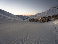 the ski slopes are in a row and there is no snow on the ground at sunset