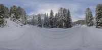 someone is snow skiing down the slope on a hill in wintertime in this photo