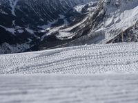 a person skiing down a hill on a sunny day of the winter time or some snow