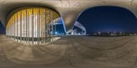 a 360 - view image of the building and its exterior taken at night showing how it was designed