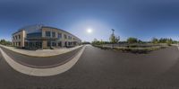 a 360 - shot of a building and street in front of it, as if not to view