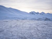 Snow Covered Alps in Europe: Contrails Across the Horizon