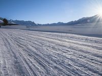 there's snow ski tracks in the snow as if it was not used as a car