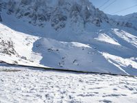 Snow-Covered Mountain in the Alps: A Clear Sky Above