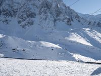 Snow-Covered Mountain in the Alps: A Clear Sky Above