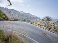Snow-covered mountain pass in Spain overlooking the coastal region
