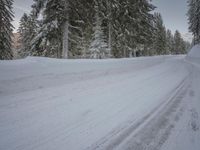 Snow Covered Mountain Road in Swiss Alps